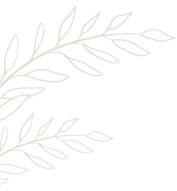 Des branches dorées avec des feuilles sur fond noir.